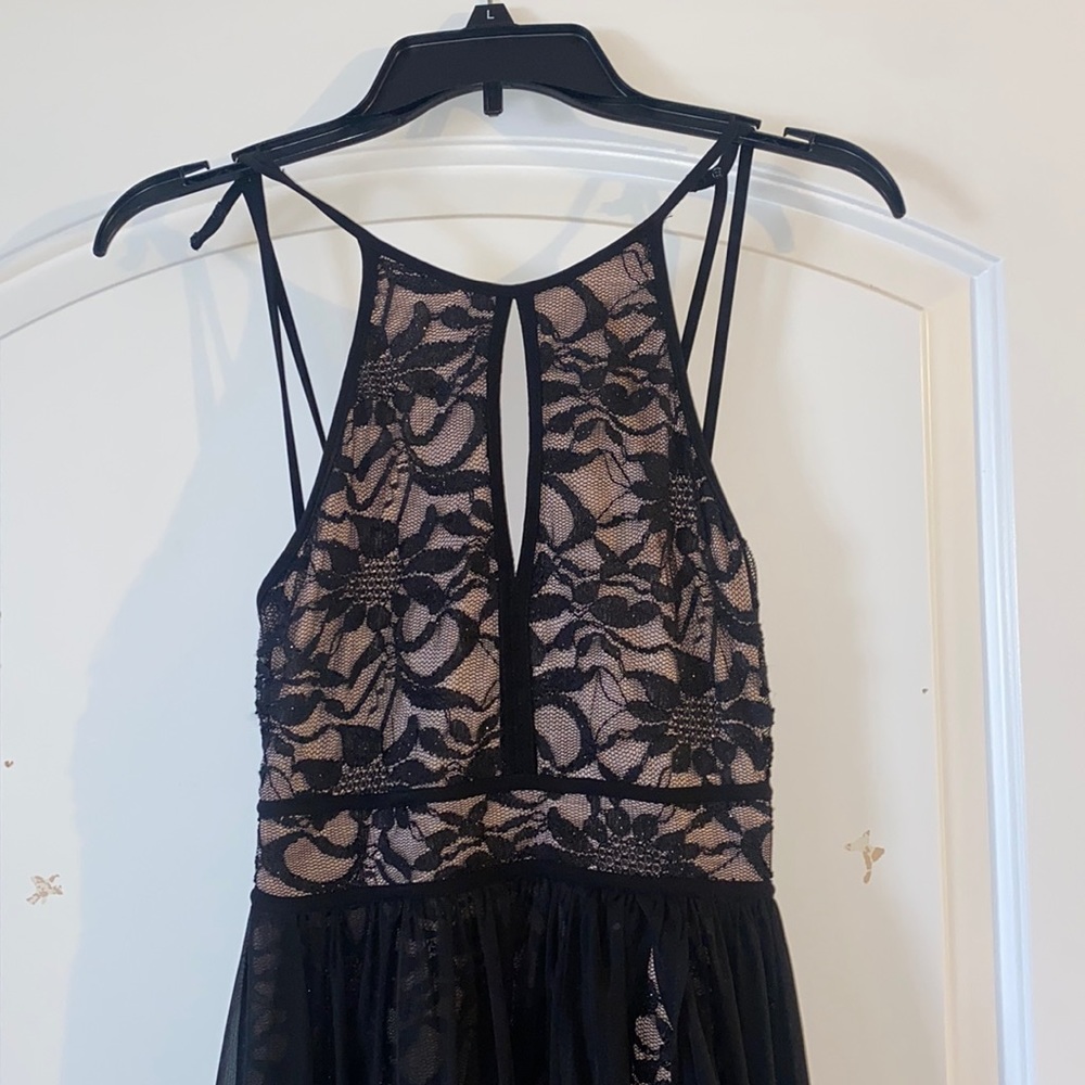 Good condition. Worn once to an occasion.